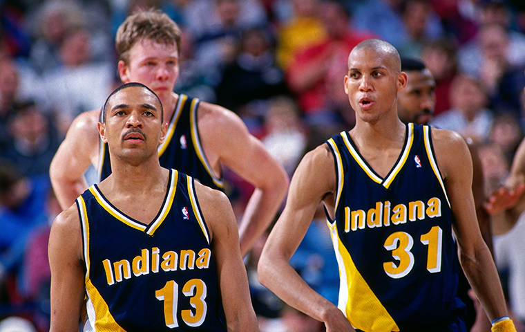 SACRAMENTO, CA - MARCH 9: Reggie Miller #31, Mark Jackson #13 and Rik Smits #45 of the Indiana Pacers look on against the Sacramento Kings on March 9, 1995 at Arco Arena in Sacramento, California. NOTE TO USER: User expressly acknowledges and agrees that, by downloading and or using this photograph, User is consenting to the terms and conditions of the Getty Images License Agreement. Mandatory Copyright Notice: Copyright 1995 NBAE (Photo by Rocky Widner/NBAE via Getty Images)